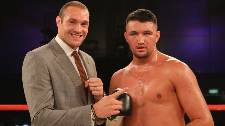 FAMILY FORTUNES?: TYSON FURY (RIGHT) AND HUGHIE FURY (LEFT) BOTH COULD INHERIT WORLD HEAVYWEIGHT CHAMPIONSHIP BELTS BY THE END OF 2015.